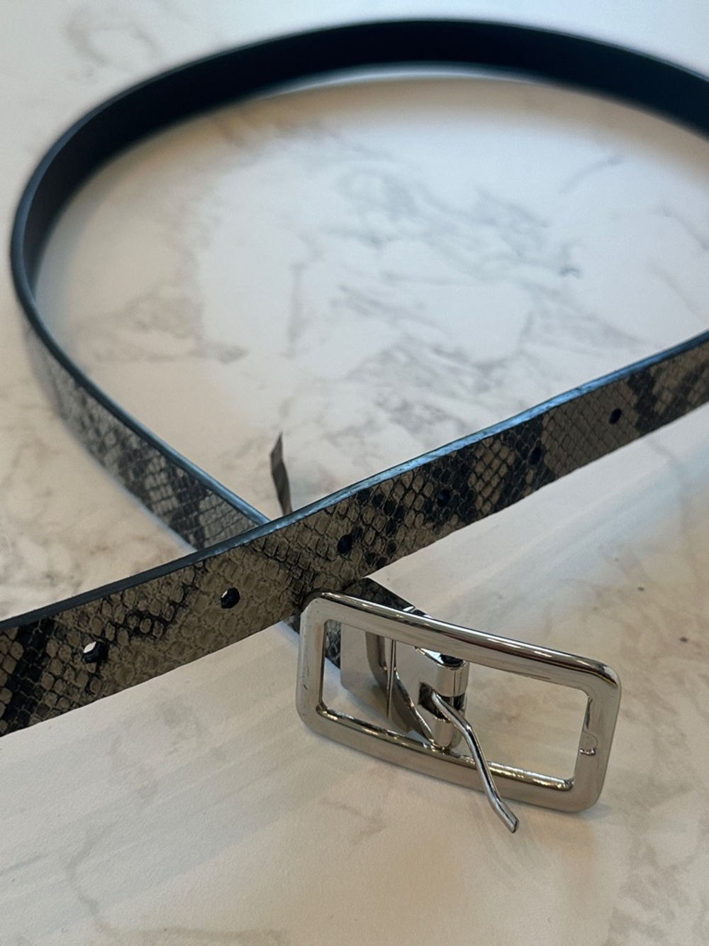 Women’s belt sz small. Like new. Express. Grey snakeskin pattern. Silver